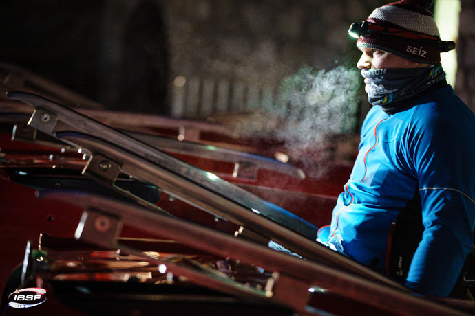 para bobsleigh monobob sled runner polishing at night arturs klots in sankt moritz ice track celerina